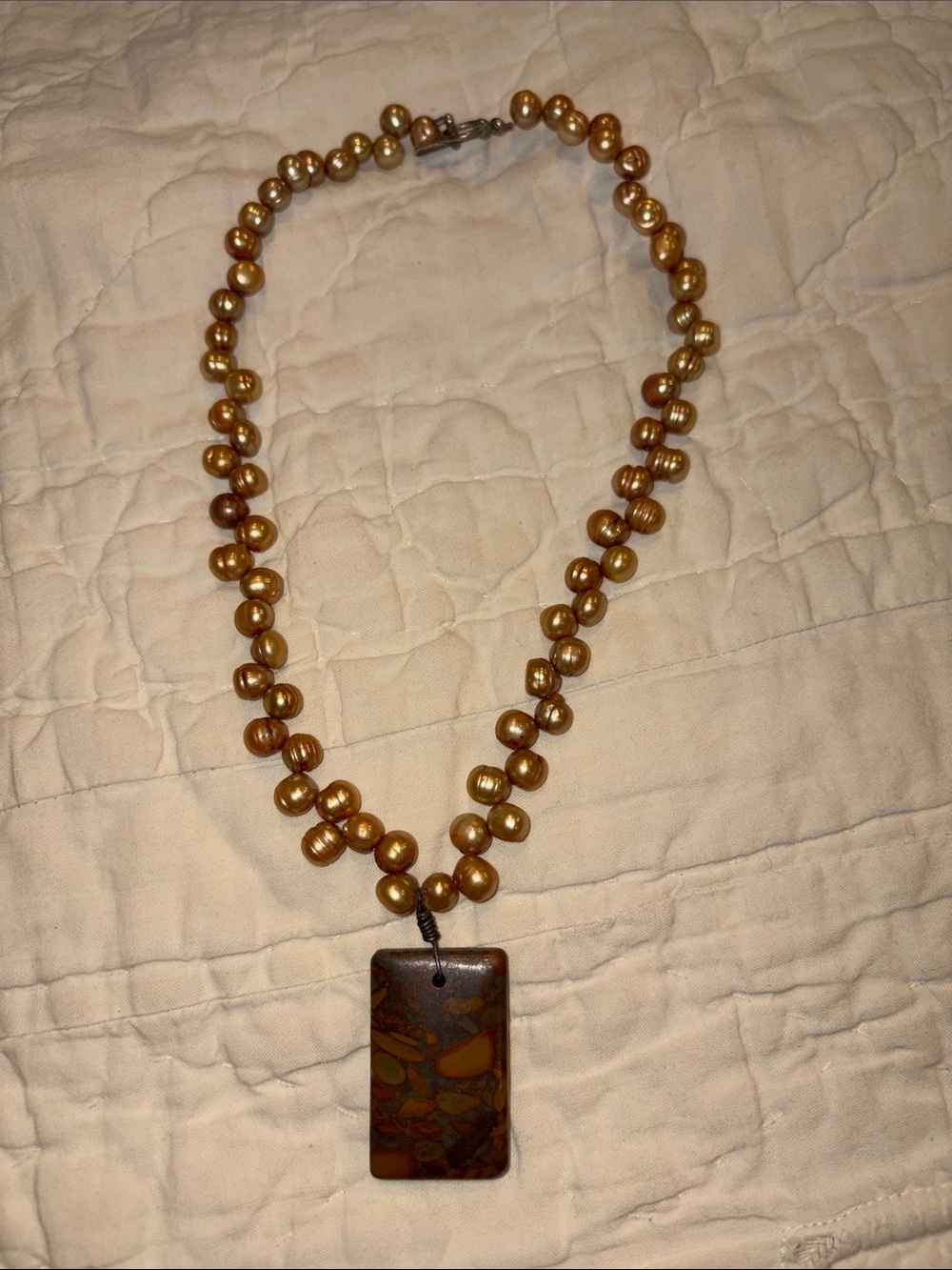 Handcrafted Golden Pearl Necklace with Brown Pendant